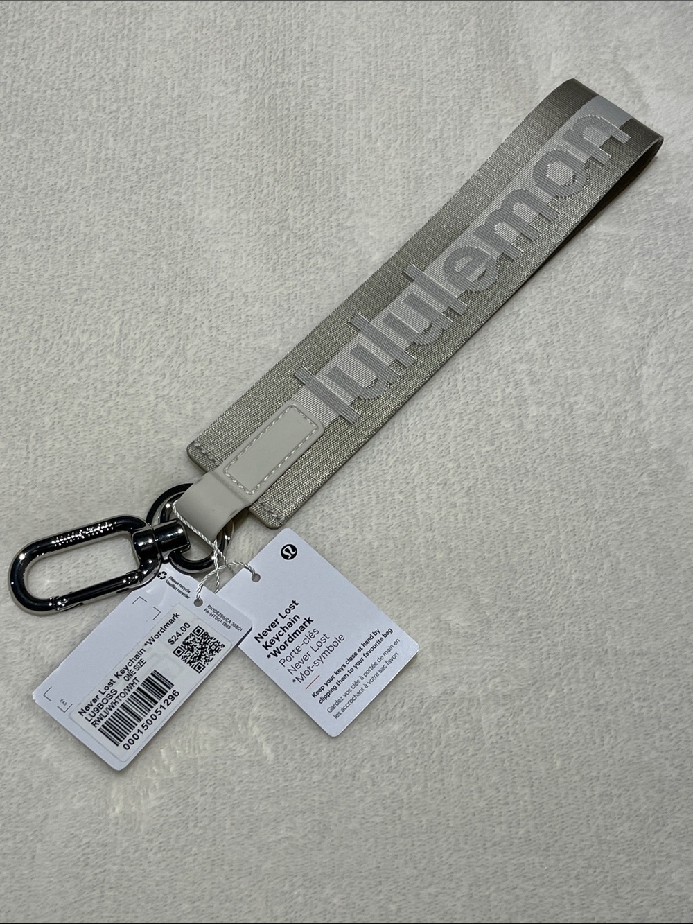 lululemon never lost keychain wordmark